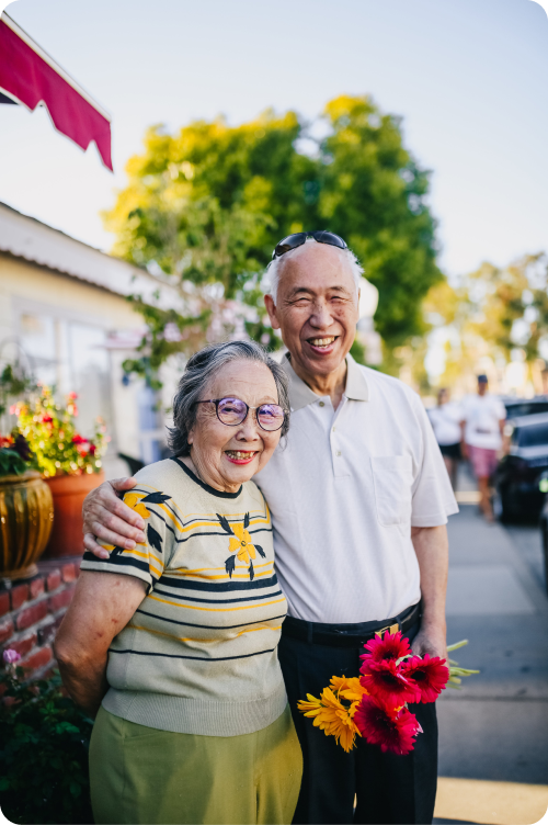 Two seniors smiling together