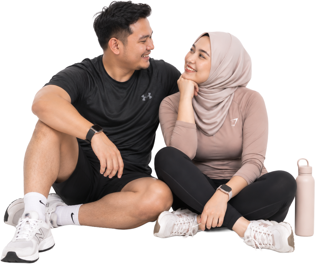 A couple sitting together after a workout